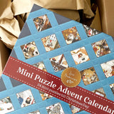 Lore Pemberton Advent Calendar 24 x 100 Piece Mini Jigsaw Puzzles | New York Puzzle Company - Jigsaw Puzzles - The Puzzle Center