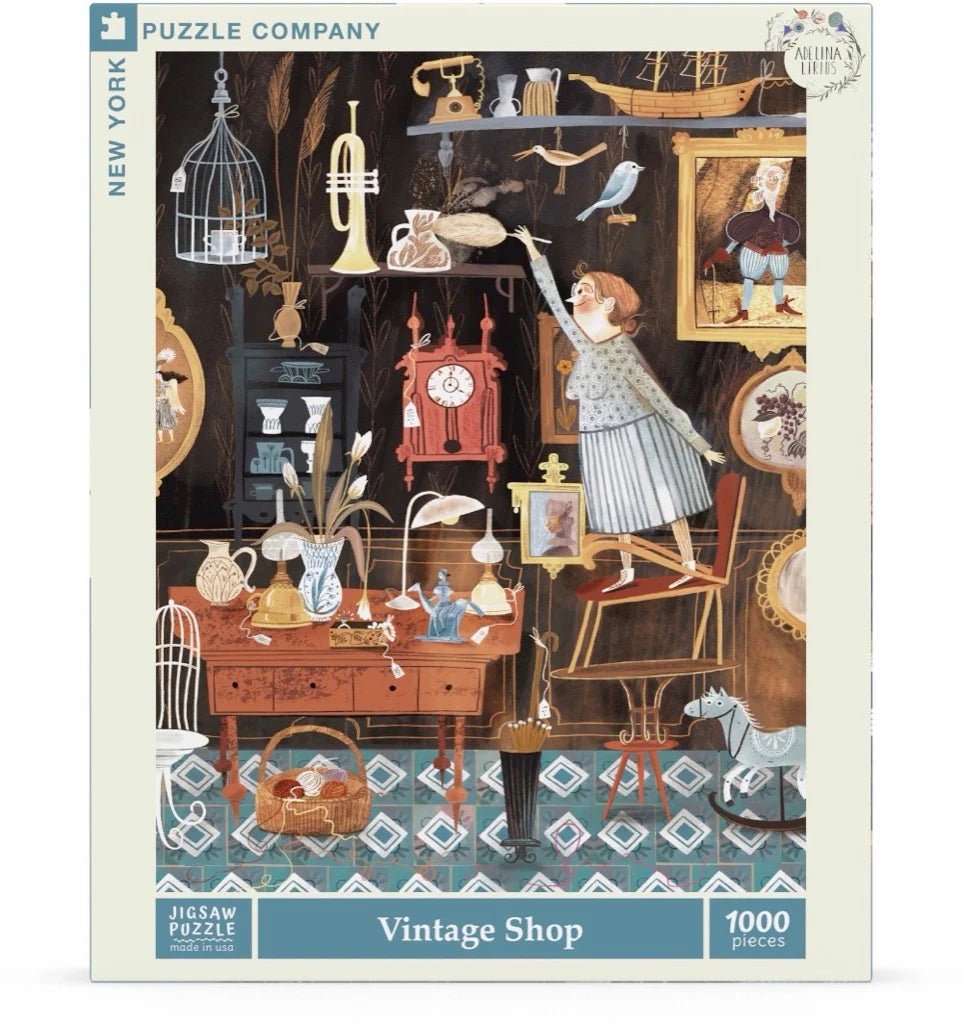 Box Cover Image of a 1000 piece jigsaw puzzle of an antique shop featuring nostalgic items like rocking horses, trumpets, and ornate furniture by New York Puzzle